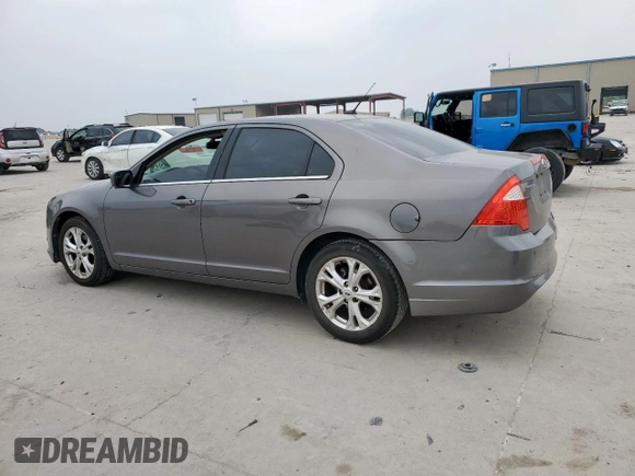 2012 Ford Fusion SE z VIN 3FAHP0HA9CR226737, wystawiony jako Copart lot #57229835 z przebiegiem 204 811 mil mil oraz Szkoda całkowita • Salvage title. Historia ofert i sprzedaży dostępna na DreamBid. Obrazek 2.