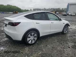 2024 Tesla Model Y Long Range z VIN 7SAYGDEE3RA283311, wystawiony jako Copart lot #56925505 z przebiegiem Nie podano mil oraz Szkoda całkowita • Salvage title. Historia ofert i sprzedaży dostępna na DreamBid. Obrazek 3.