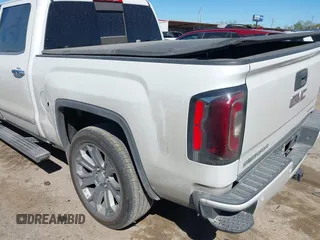 2017 GMC Sierra 1500 Denali with VIN 3GTU2PEJ4HG197560, listed as a IAAI auction lot 41814300 with 93,311 mi miles and . Bid and sale history available at DreamBid. Image 3.
