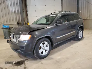 2011 Jeep Grand Cherokee Laredo with VIN 1J4RS4GG9BC517059, listed as a Copart auction lot 52704705 with 120,171 mi miles and Salvage Title. Bid and sale history available at DreamBid. Image 1.