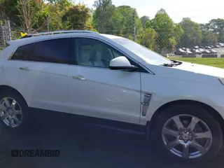 2012 Cadillac SRX Performance Collection с VIN 3GYFNBE30CS599466, выставлен на аукционе IAAI как лот 42053911 с пробегом 167 242 миль миль и . История ставок и продаж доступна на DreamBid. Изображение 13.