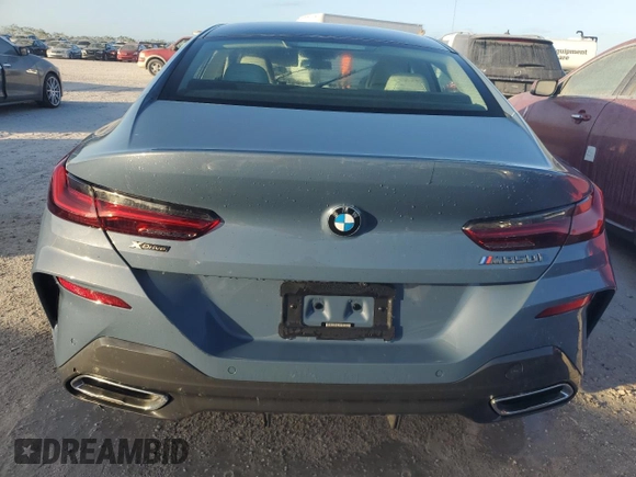 2022 BMW 8 Series M850i с VIN WBAGV8C06NCH25022, выставлен на аукционе Copart как лот 75720384 с пробегом Не указан миль и На запчасти • Non repairable. История ставок и продаж доступна на DreamBid. Изображение 6.