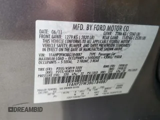 2011 Ford Taurus Limited with VIN 1FAHP2FW3BG184887, listed as a Copart auction lot 60717875 with 196,102 mi miles and Salvage title. Bid and sale history available at DreamBid. Image 12.