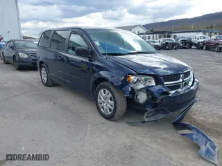 2016 Dodge Grand Caravan SE with VIN 2C4RDGBG4GR146450, listed as a IAAI auction lot 42015145 with 128,725 mi miles. Bid and sale history available at carsss.com. Image 1.