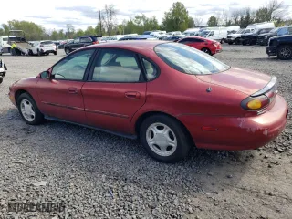 1997 Ford Taurus GL with VIN 1FALP52U4VG234295, listed as a Copart auction lot 51112714 with 118,005 mi miles and Salvage Title. Bid and sale history available at carsss.com. Image 2.