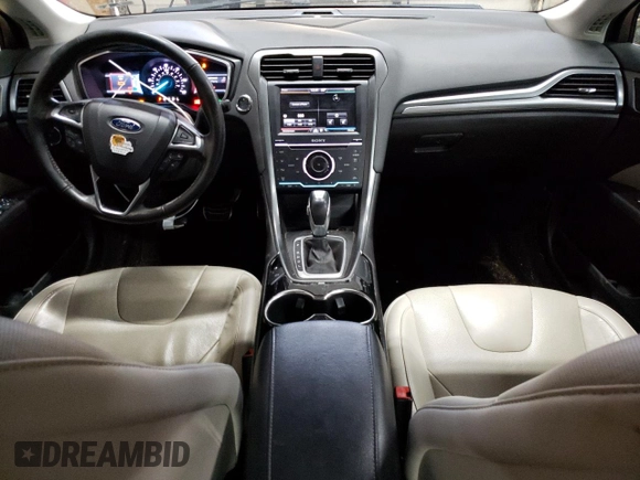 2014 Ford Fusion Titanium Hybrid with VIN 3FA6P0RU6ER219036, listed as a Copart auction lot 57476985 with 189,113 mi miles and Clean title. Bid and sale history available at DreamBid. Image 8.