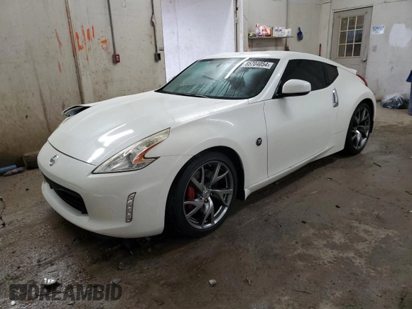 2013 Nissan 370Z Touring z VIN JN1AZ4EH5DM383466, wystawiony jako Copart lot #85704054 z przebiegiem 37 892 mil mil oraz Szkoda całkowita • Salvage title. Historia ofert i sprzedaży dostępna na DreamBid. Obrazek 1.