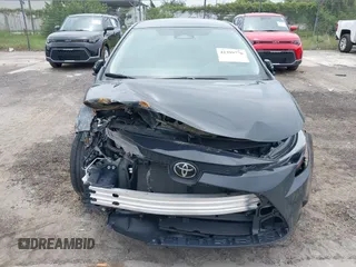 2024 Toyota Corolla LE z VIN 5YFB4MDE6RP131723, wystawiony jako IAAI lot #42399776 z przebiegiem 20 167 mil mil oraz . Historia ofert i sprzedaży dostępna na DreamBid. Obrazek 6.