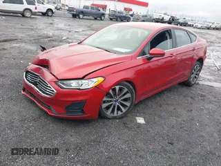 2020 Ford Fusion SE z VIN 3FA6P0T97LR234873, wystawiony jako IAAI lot #41510333 z przebiegiem 65 243 mil mil oraz . Historia ofert i sprzedaży dostępna na DreamBid. Obrazek 19.