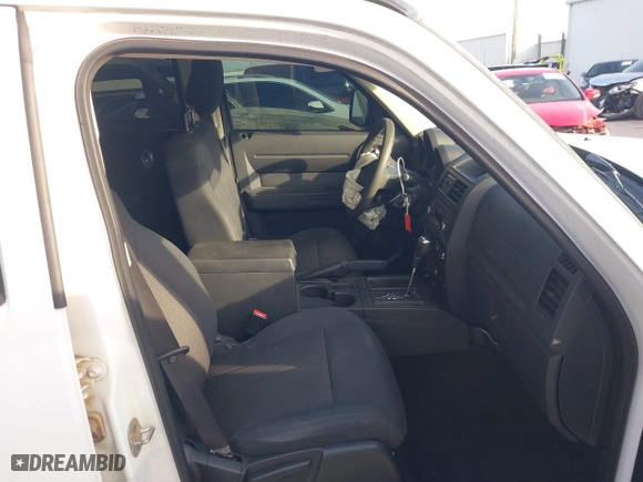 2011 Dodge Nitro Heat with VIN 1D4PT4GK0BW582589, listed as a IAAI auction lot 41015035 with 130,098 mi miles. Bid and sale history available at carsss.com. Image 5.