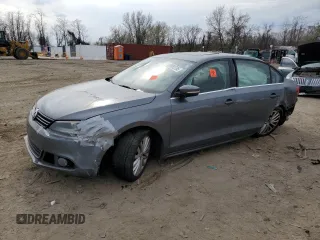 2014 Volkswagen Jetta SEL z VIN 3VWL17AJ9EM441590, wystawiony jako Copart lot #50995785 z przebiegiem Nie podano mil oraz Szkoda całkowita • Salvage title. Historia ofert i sprzedaży dostępna na DreamBid. Obrazek 1.