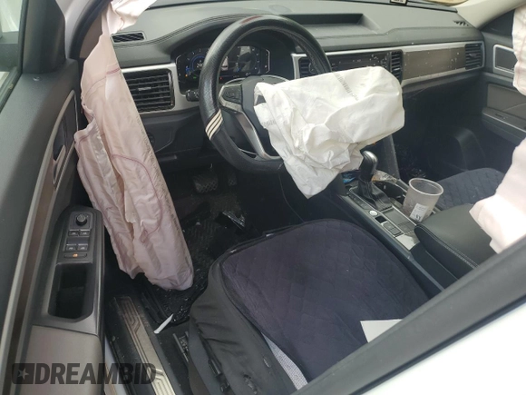 2023 Volkswagen Atlas SE with VIN 1V2WR2CA5PC557834, listed as a Copart auction lot 52765575 with 63,991 mi miles and Salvage title. Bid and sale history available at DreamBid. Image 8.