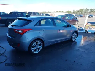 2014 Hyundai Elantra GT with VIN KMHD35LH1EU162934, listed as a IAAI auction lot 41705866 with 121,709 mi miles. Bid and sale history available at carsss.com. Image 4.