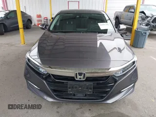 2020 Honda Accord with VIN 1HGCV3F10LA015906, listed as a IAAI auction lot 41895296 with 106,341 mi miles and . Bid and sale history available at DreamBid. Image 12.