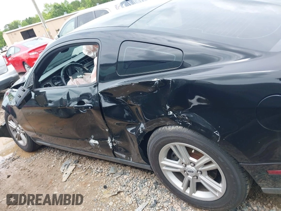 2012 Ford Mustang Premium with VIN 1ZVBP8AM4C5285696, listed as a IAAI auction lot 42465296 with 143,387 mi miles and . Bid and sale history available at DreamBid. Image 15.