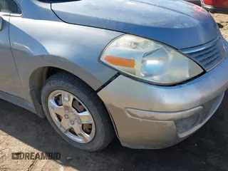 2007 Nissan Versa 1.8 SL with VIN 3N1BC11E37L432291, listed as a IAAI auction lot 41357144 with 136,039 mi miles. Bid and sale history available at carsss.com. Image 6.