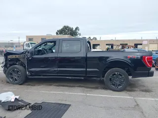 2022 Ford F-150 XL with VIN 1FTFW1E83NFB19601, listed as a IAAI auction lot 41723187 with 21,002 mi miles and . Bid and sale history available at carsss.com. Image 14.