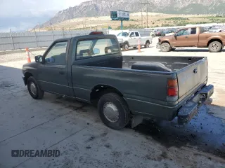 1994 Isuzu Pickup S z VIN JAACL11L2R7221226, wystawiony jako Copart lot #59027295 z przebiegiem 129 494 mil mil oraz Tytuł czysty. Historia ofert i sprzedaży dostępna na DreamBid. Obrazek 2.