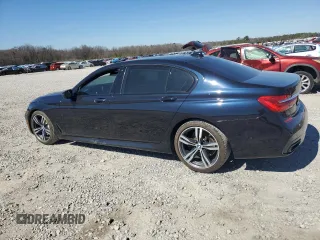 2016 BMW 7 Series 750i with VIN WBA7F0C57GGL99153, listed as a Copart auction lot 45475755 with 140,328 mi miles and Salvage title. Bid and sale history available at DreamBid. Image 2.