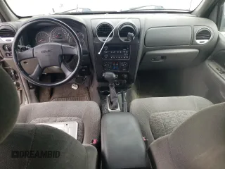 2003 GMC Envoy SLE z VIN 1GKDT13S332365071, wystawiony jako Copart lot #52811295 z przebiegiem Nie podano mil oraz Szkoda całkowita • Salvage title. Historia ofert i sprzedaży dostępna na DreamBid. Obrazek 8.