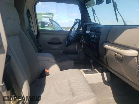 2003 Jeep Wrangler Sahara with VIN 1J4FA59S23P303845, listed as a Copart auction lot 68101244 with 141,753 mi miles and Clean Title. Bid and sale history available at carsss.com. Image 10.