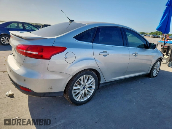 2017 Ford Focus Titanium с VIN 1FADP3J28HL279910, выставлен на аукционе Copart как лот 62967675 с пробегом 133 651 миль миль и Чистый • Clean title. История ставок и продаж доступна на DreamBid. Изображение 3.