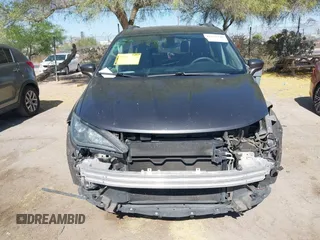 2017 Chrysler Pacifica Touring L with VIN 2C4RC1BG0HR826881, listed as a IAAI auction lot 42171240 with 214,188 mi miles and . Bid and sale history available at DreamBid. Image 12.
