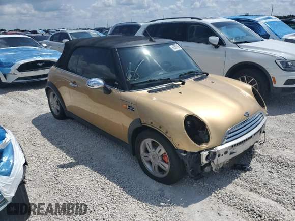 2005 MINI Convertible with VIN WMWRF334X5TG11889, listed as a Copart auction lot 55567995 with 169,717 mi miles and Salvage title. Bid and sale history available at DreamBid. Image 4.