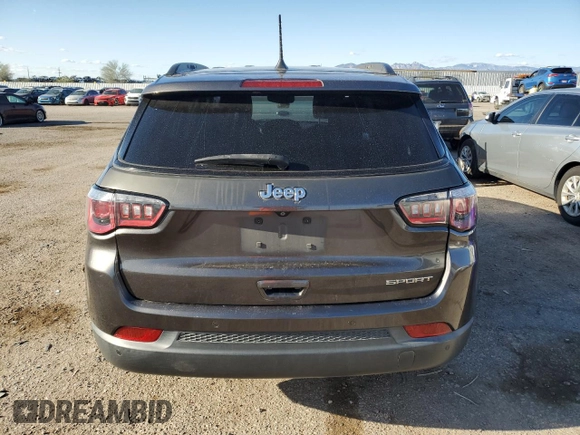 2018 Jeep Compass Sport with VIN 3C4NJCAB7JT250795, listed as a Copart auction lot 48939925 with 144,823 mi miles and Salvage Title. Bid and sale history available at carsss.com. Image 6.