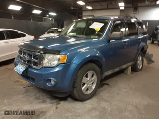 2009 Ford Escape XLT with VIN 1FMCU93G99KB70918, listed as a IAAI auction lot 41942399 with 141,158 mi miles. Bid and sale history available at carsss.com. Image 18.