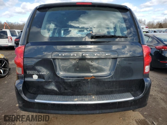 2014 Dodge Grand Caravan SE with VIN 2C4RDGBG0ER136799, listed as a Copart auction lot 45430905 with 148,309 mi miles and Clean Title. Bid and sale history available at DreamBid. Image 6.