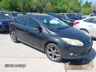 2014 Ford Focus SE with VIN 1FADP3K28EL213304, listed as a IAAI auction lot 41990826 with 165,398 mi miles. Bid and sale history available at carsss.com. Image 1.