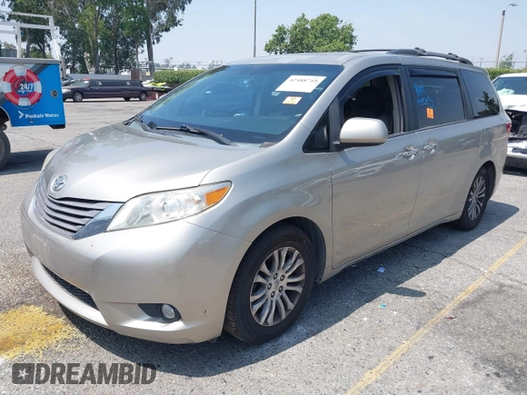 2015 Toyota Sienna XLE with VIN 5TDYK3DC4FS560743, listed as a IAAI auction lot 42488745 with 145,009 mi miles and . Bid and sale history available at DreamBid. Image 2.