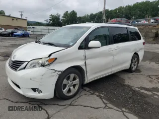 2015 Toyota Sienna LE AAS with VIN 5TDKK3DCXFS590626, listed as a Copart auction lot 63081115 with 144,933 mi miles and Salvage title. Bid and sale history available at DreamBid. Image 1.