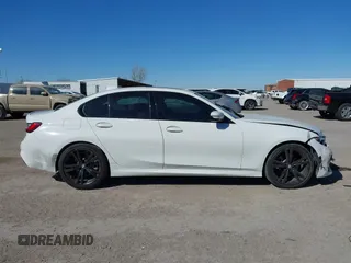 2022 BMW 3 Series 330i with VIN 3MW5R1J04N8C30165, listed as a IAAI auction lot 41412370 with 49,015 mi miles and . Bid and sale history available at DreamBid. Image 13.