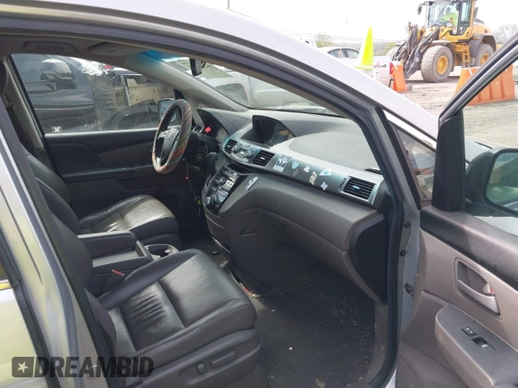 2012 Honda Odyssey EX-L with VIN 5FNRL5H68CB131431, listed as a IAAI auction lot 42012749 with 245,649 mi miles and . Bid and sale history available at carsss.com. Image 5.