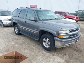 2002 Chevrolet Tahoe LS z VIN 1GNEC13Z62J236606, wystawiony jako IAAI lot #41529701 z przebiegiem 271 280 mil mil oraz . Historia ofert i sprzedaży dostępna na DreamBid. Obrazek 1.