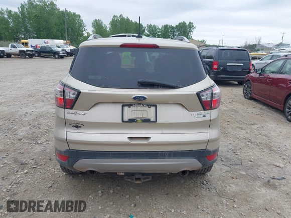 2018 Ford Escape Titanium with VIN 1FMCU9J94JUA44964, listed as a IAAI auction lot 42494471 with 100,955 mi miles and . Bid and sale history available at DreamBid. Image 16.