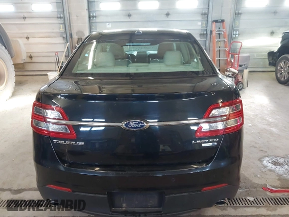 2015 Ford Taurus Limited with VIN 1FAHP2J87FG172580, listed as a IAAI auction lot 41891567 with 183,784 mi miles. Bid and sale history available at carsss.com. Image 16.
