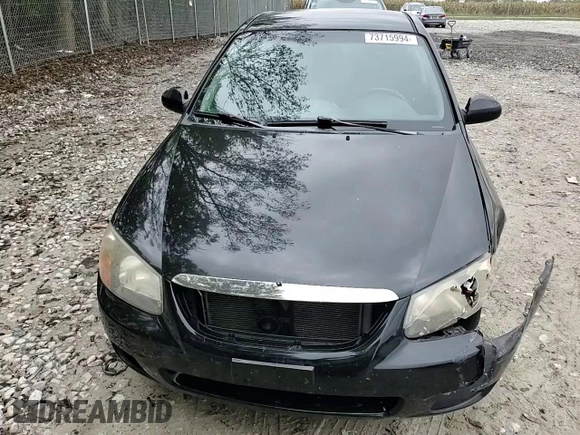 2009 Kia Spectra EX with VIN KNAFE221395026165, listed as a Copart auction lot 73715994 with 245,813 mi miles and Salvage Title. Bid and sale history available at carsss.com. Image 11.