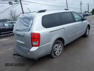 2012 Kia Sedona LX with VIN KNDMG4C72C6485952, listed as a IAAI auction lot 42029147 with 129,296 mi miles. Bid and sale history available at carsss.com. Image 4.