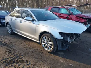 2015 Audi A6 3.0T Premium Plus with VIN WAUFGAFC3FN022807, listed as a IAAI auction lot 41401587 with 116,927 mi miles. Bid and sale history available at carsss.com. Image 1.