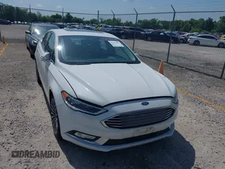 2018 Ford Fusion Titanium with VIN 3FA6P0D98JR134230, listed as a IAAI auction lot 42567084 with 107,459 mi miles and . Bid and sale history available at DreamBid. Image 6.