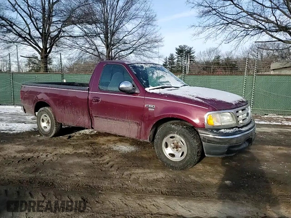 1999 Ford F-150 with VIN 1FTRF17W7XNA44872, listed as a Copart auction lot 41815695 with 182,678 mi miles and Salvage title. Bid and sale history available at DreamBid. Image 10.