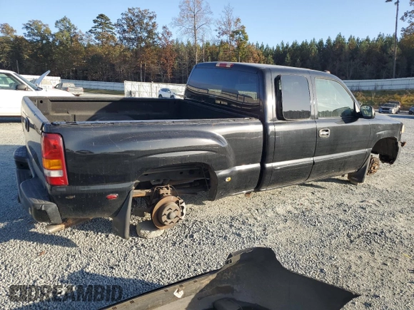 2003 GMC Sierra Denali z VIN 2GTFK69U031261036, wystawiony jako Copart lot #75353324 z przebiegiem 192 762 mil mil oraz Szkody całkowita. Historia ofert i sprzedaży dostępna na DreamBid. Obrazek 3.