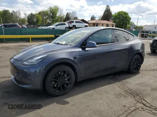 2022 Tesla Model Y Long Range z VIN 7SAYGDEEXNF356834, wystawiony jako Copart lot #57877475 z przebiegiem 35 315 mil mil oraz Szkoda całkowita • Salvage title. Historia ofert i sprzedaży dostępna na DreamBid. Obrazek 1.