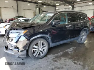 2017 Honda Pilot Touring with VIN 5FNYF6H97HB036935, listed as a Copart auction lot 71757334 with 68,641 mi miles and Salvage Title. Bid and sale history available at DreamBid. Image 1.