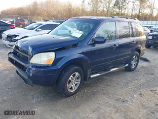 2004 Honda Pilot EX with VIN 2HKYF18564H566356, listed as a IAAI auction lot 41226359 with 363,625 mi miles. Bid and sale history available at carsss.com. Image 2.