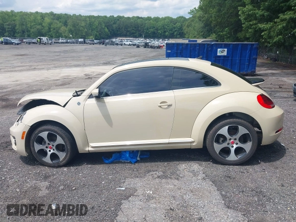 2019 Volkswagen Beetle S with VIN 3VWFD7AT2KM700941, listed as a IAAI auction lot 42474867 with 43,891 mi miles and . Bid and sale history available at DreamBid. Image 15.