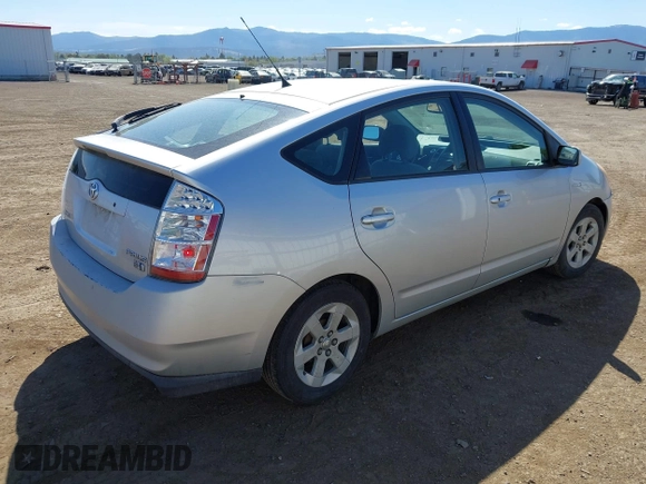 2007 Toyota Prius with VIN JTDKB20U677611878, listed as a IAAI auction lot 42233105 with 291,499 mi miles and . Bid and sale history available at DreamBid. Image 4.